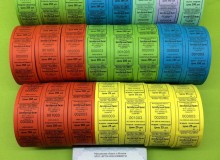 Автобусные билеты на цветной бумаге с перфорацией формата 30х40мм в рулонах по 1000 штук