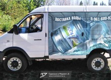 Трёхмерная реклама на кузове авто питьевой воды ТМ «AQUALeader». Левый борт.  г.Волжский. 2018 год.
